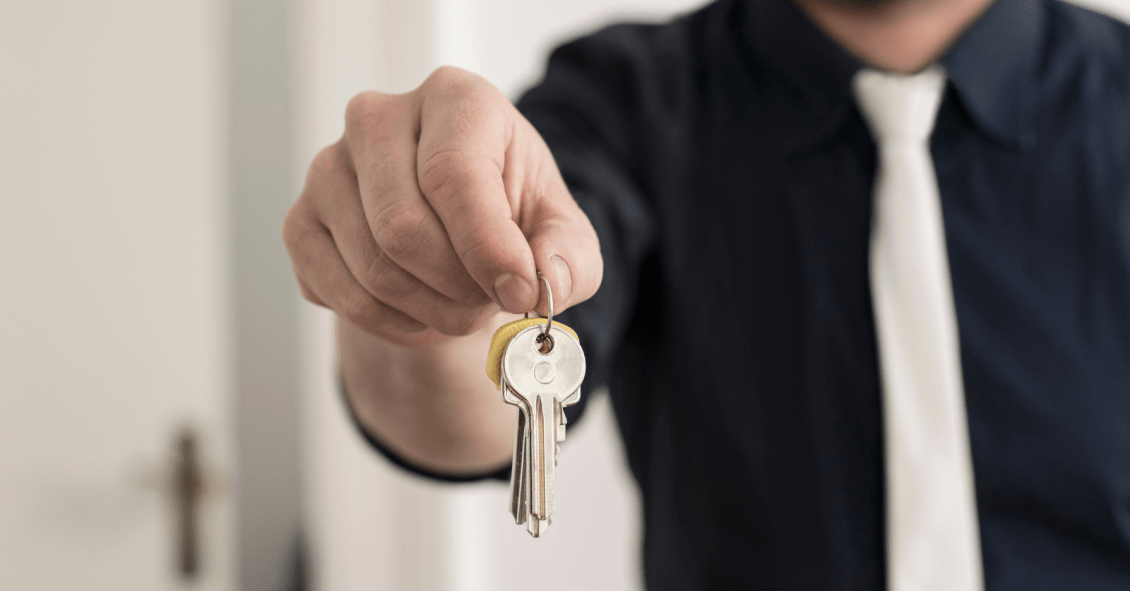 Man holding keys real estate